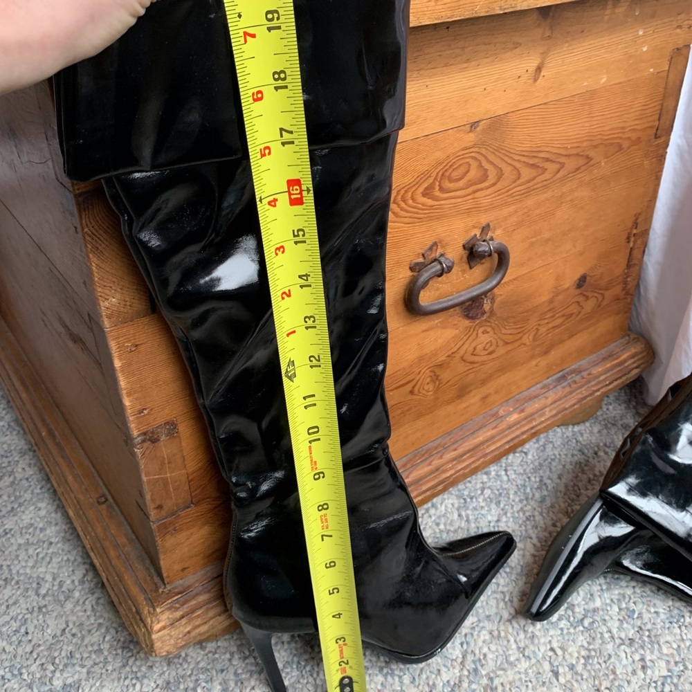 Black patent leather stiletto pirate boots